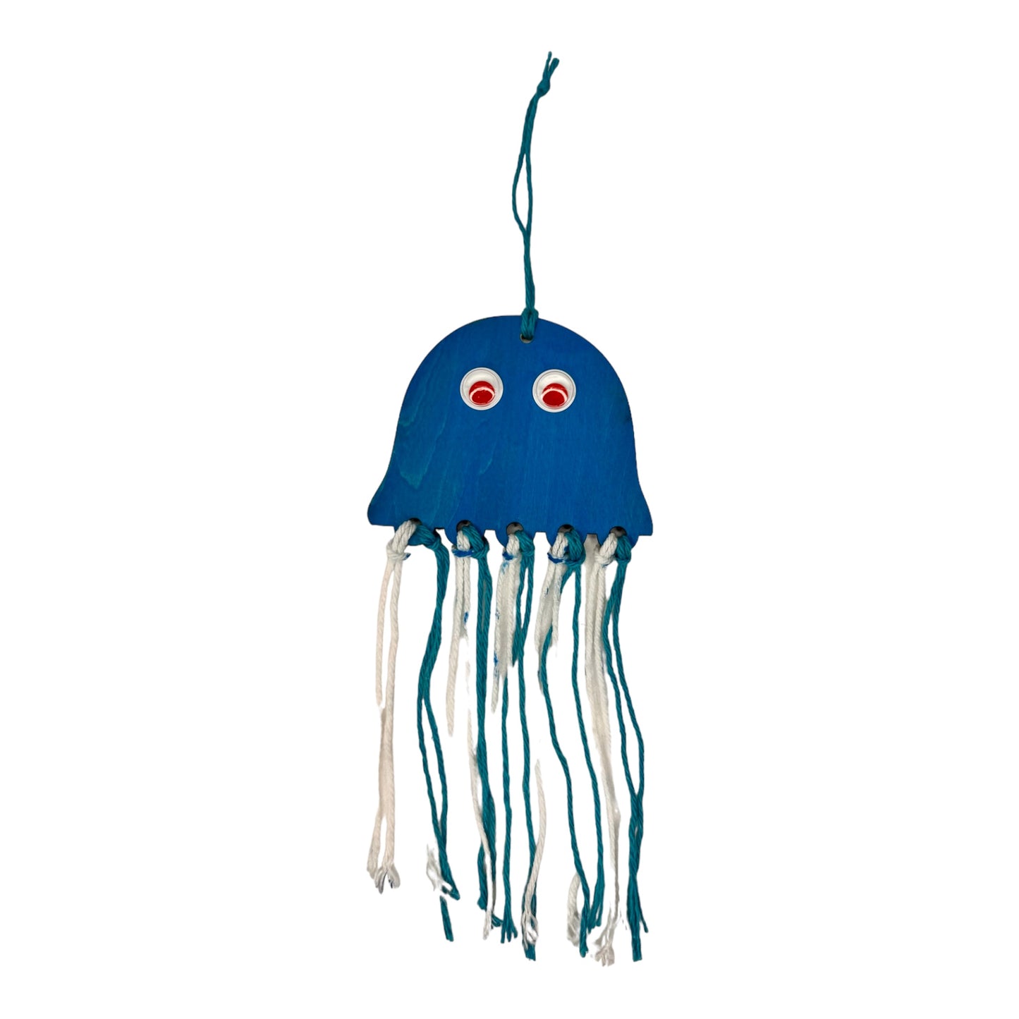 A laser cut wooden squid decoration featuring colorful yarn tentacles and wiggly eyes