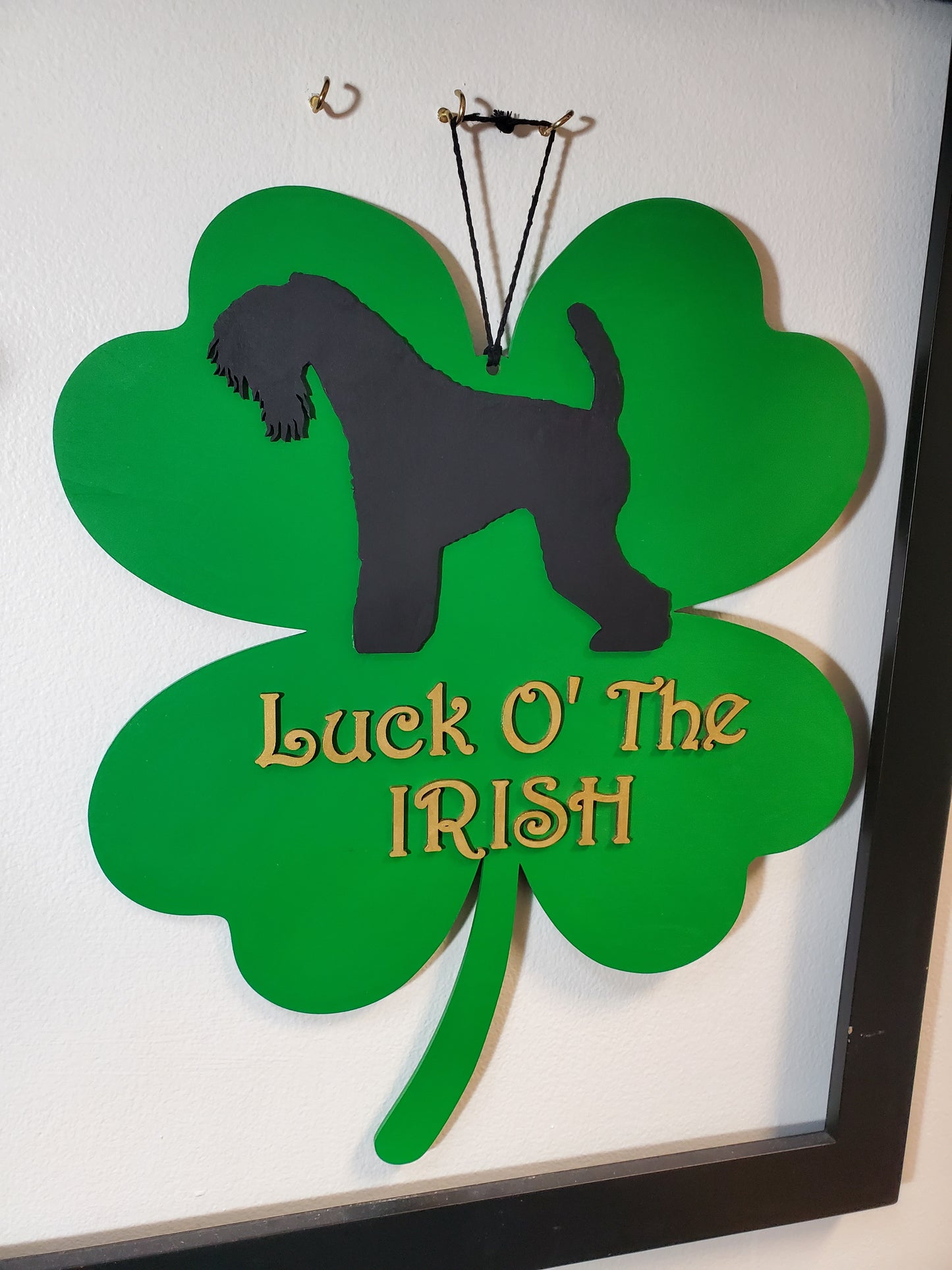 Kerry Blue black Dog On a Shamrock backing hand painted green with gold letters "Luck O' The Irish". Ready to hang.