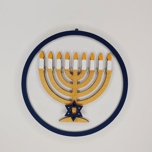 A Menorah On A Small Wood Round Decor Piece