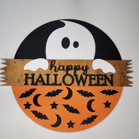 Halloween-themed decorative sign with ghost, bats, and 'Happy Halloween' text on an orange and black background. Door round or shelf leaner. Sizes 7inch, 12 inch or 16 inch. DIY kit available.