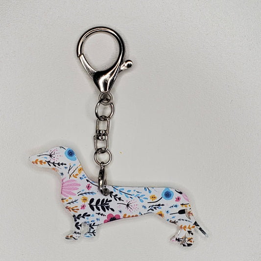 Keychain with floral design. Smooth dachshund. Short hair dachshund